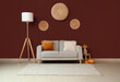 © Pixel-Shot - Comfortable sofa, floor lamp and autumn decor near red wall in interior of living room