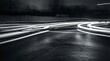 © flashmovie - Vehicle light trails carve flowing monochrome lines along a dark urban highway at night, long-exposure motion blur conveying speed, energy and dynamic movement through the cityscape