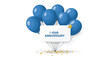 © Juwel - A cluster of blue balloons holds a 1 Year Anniversary sign with scattered gold confetti below.