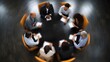 © Thares2020 - Overhead view of a diverse business team engaged in a dynamic meeting around a circular conference table with a sense of motion