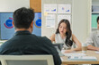 © whyframeshot - Business professionals discussing strategy in office meeting using tablet analytics and reports, teamwork collaboration analyzing market data, corporate planning session driving innovation, productivi