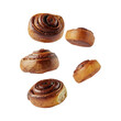 © Nur Design Studio 74 - Assorted Cinnamon Rolls of Different Shapes and Sizes Isolated on Transparent Background