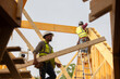 © Raymond Forbes LLC/Stocksy - Construction Site with workers