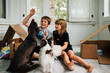 © Jessica Byrum/Stocksy - Kids & Dogs