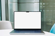 © Artem Podrez/Stocksy - Laptop Mockup with White Blank Screen on Office Table