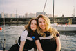 © Asya Molochkova/Stocksy - Portrait of two young women before a yacht trip
