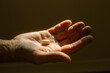 © Maryanne Gobble/Stocksy - Vitamin in Hand