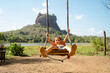 © Gemma can fly/Stocksy - Child Swing Sigiriya, Sri Lanka. Landmark, travel.