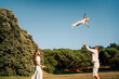 © Maria Sher/Stocksy - Family Enjoys Playful Afternoon With Child Flying in the Air