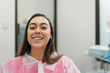 © Leonardo Borges/Stocksy - Smiling patient after dental treatment