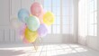 © Nadiia - Bunch of pastel balloons floating in bright white room with large windows and soft sunlight shining through
