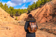 © unai - Woman hiking through las arcillas natural park in teruel spain