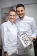 © auremar - portrait of male and female chefs holding ice-cream