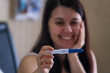 © phpetrunina14 - Surprised Woman with Positive Pregnancy Test