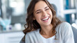 © Nataliya - Happy woman laughing at dentist office, dental checkup joyful experience, positive patient interaction, oral care satisfaction, with copy space