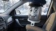 © Elizaveta - Police seatbelt buckle mascot in car