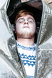 © Stephen - The body of a young man inside a body bag about to be zipped up.