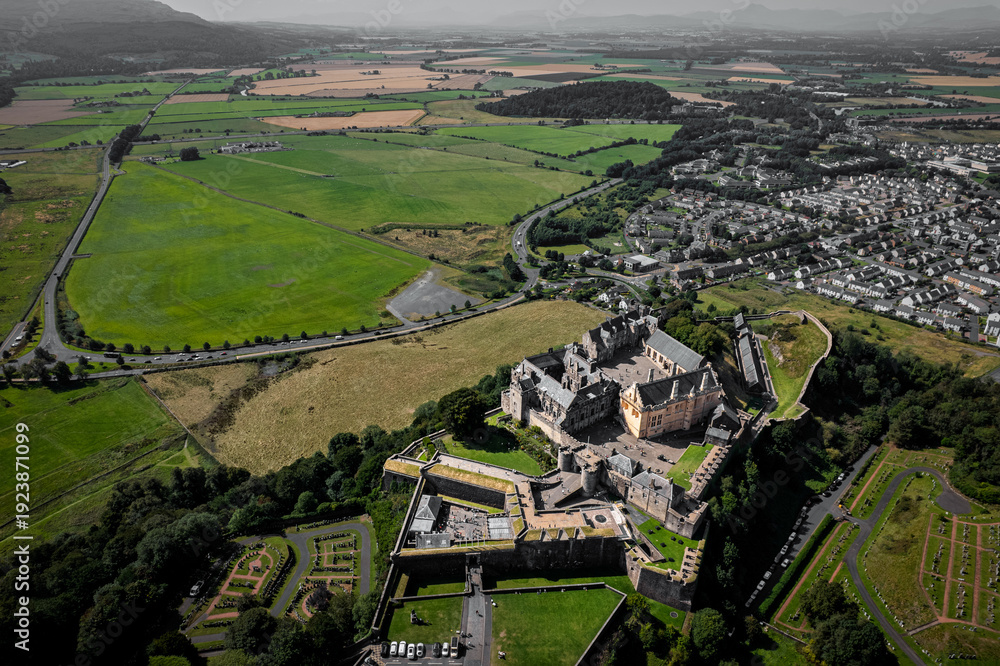 Aerial view of a historic castle complex and surrounding landscape in ...