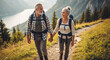 © NeuroCake - Senior couple hiking hand-in-hand on a mountain trail. Active elderly man and woman smiling in nature