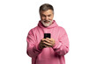 © opolja - Smiling mature man wearing pink sweatshirt looking at smartphone, isolated on transparent
