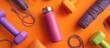 © Craft Studio - Fitness Essentials on Orange: An invigorating composition of workout equipment and accessories, meticulously arranged against a vibrant orange backdrop, fueling inspiration for fitness and wellness.