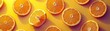 © kramynina - Group of orange slices on a yellow surface food background banner