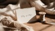 © Anna - Day of hope handwritten tent card with deckled edges and rustic twine spool in warm boho styling for invitation,Day of hope