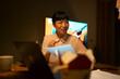 © Artcore Studio/Stocksy - Asian businesswoman discussing project during late night meeting