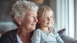 © Atmospheric stock - Elderly caucasian woman and young caucasian child enjoying time together by window