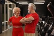 © New Africa - Senior couple wearing stylish sportswear in gym
