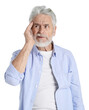© New Africa - Amnesia. Senior man trying to remember something on white background