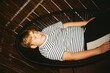 © Anna Malgina/Stocksy - Kid resting striped shirt