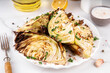 © ricka_kinamoto - Roasted baked cabbage with cheese and aromatic herbs