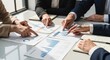 © MUGU STD - Business Team Analyzing Financial Reports and Charts