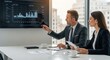 © MUGU STD - Business meeting analyzing cash flow chart on screen