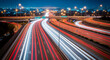 © Lucianastudio - Capturing the dynamic flow of traffic at night on a multi-lane highway with streaks of light from moving vehicles creating a sense of speed and motion
