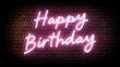 © Sakinatus - Neon happy birthday sign on brick wall celebration and greetings