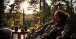 © Inai - Woman relaxing in chair on forest terrace of countryside house in warm morning sunlight. Outdoor slow living and wellness lifestyle concept for retreat marketing and real estate.