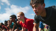© Broccolini - diverse youth soccer team warming up on field, smiling young girl athlete in orange sports jersey, group of active children training outdoors for football