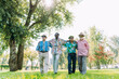 © oneinchpunch - group of senior friends playing at the park