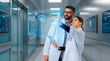 © Rendara Studio - Hospital doctors reviewing AI patient analysis and predictive brain model interface