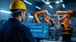 © geny - Factory worker observes robotic arms via computer screen. Automation manufacturing process Industry 4. 0, IOT software control operation. Modern digital industrial revolution, engineering in
