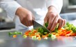 © ladaz - Chefs Hands Chopping Vibrant Vegetables in Kitchen