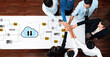 © InfiniteFlow - Team members focused on collaboration engage around a table with hands united over cloud technology, symbolizing teamwork, innovation, and strategic planning. Gantry