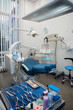 © Serega - Exam room setup in a dental clinic with equipment ready for patient care
