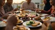 © MayStudio.ai - Happy Muslim family enjoying Iftar dinner together at home during Ramadan.