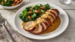 © VolumeThings - Pork tenderloin with mustard tarragon sauce, served on a white plate alongside kale and almond salad, captured from above on a white wooden table