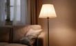 © simba kim - Warm glow from a standing floor lamp providing comfort and intimacy in a dimly lit room