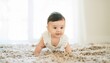 © Novi - Adorable Baby Boy Crawling on Soft Carpet, Natural Light, Happy Expression, Childhood Innocence, Studio Portrait