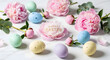 © Suta - Pastel Easter Eggs and Delicate Peony Flowers on a Marble Surface, a Celebration of Spring's Arrival and Festive Traditions
